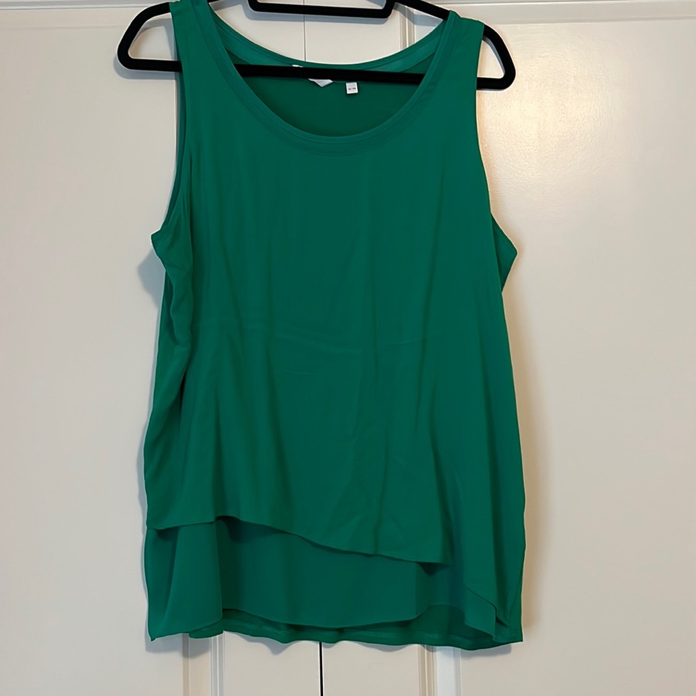 Ladies flowy sleeveless blouse.